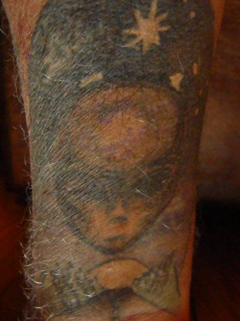 alien tattoo of jim andre acushnet